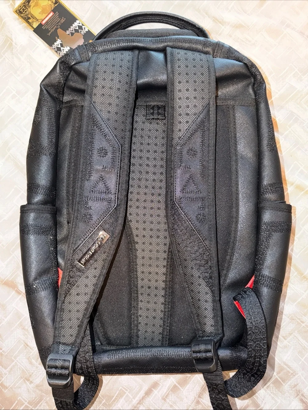 Sprayground Black Embossed African Intelligence Backpack